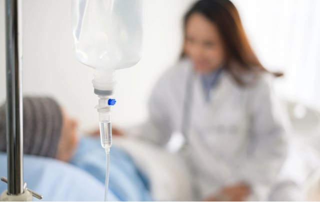 chemotherapy treatment with patient and doctor